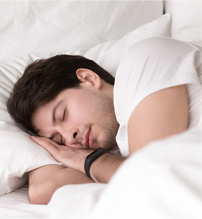 Woman sleeping peacefully in bed